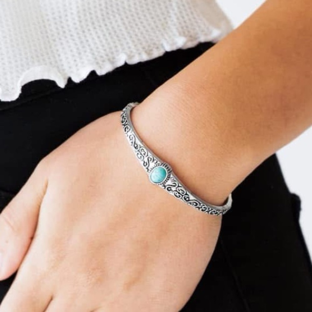 Small embossed silver cuff with turquoise stone